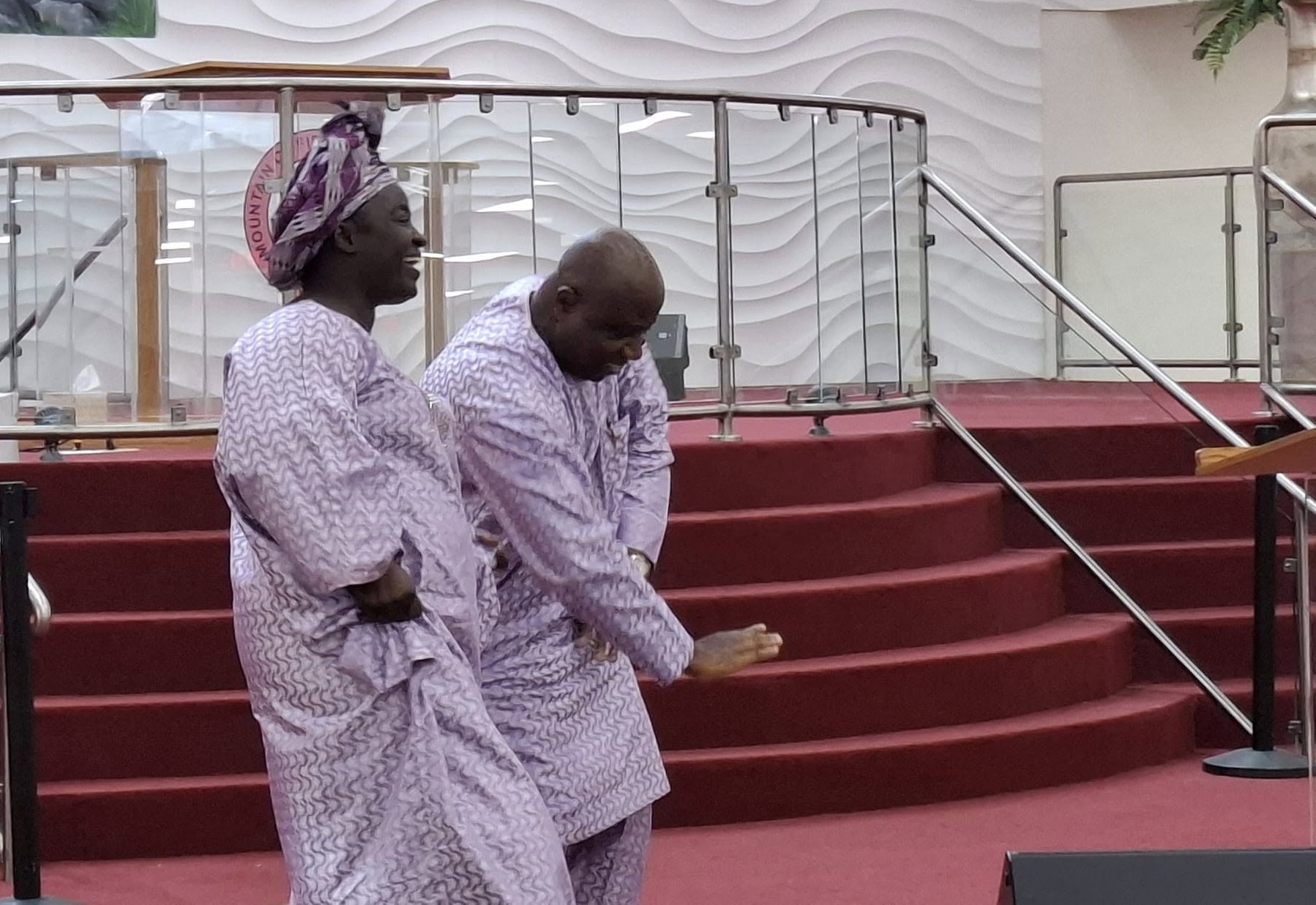 Pastor and Pastor (Mrs.) Oni in worship